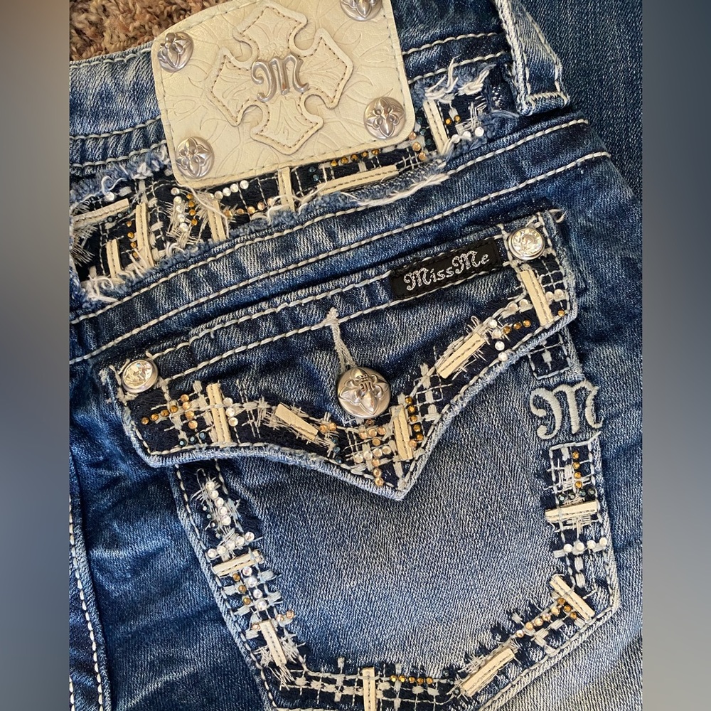 Signature Miss Me boot cut jeans